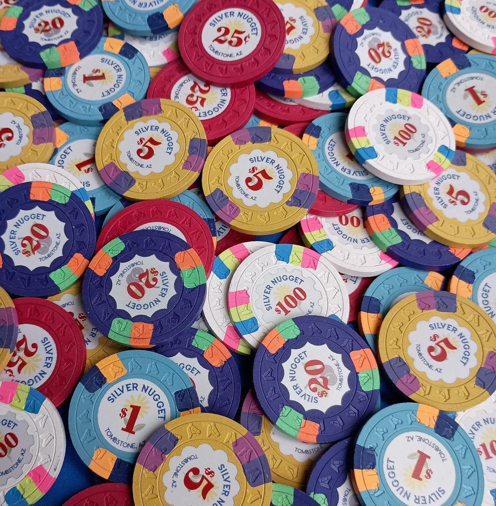 A pile of Silver Nugget chips in red, blue, yellow, and white
